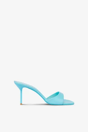Mules in turquoise leather