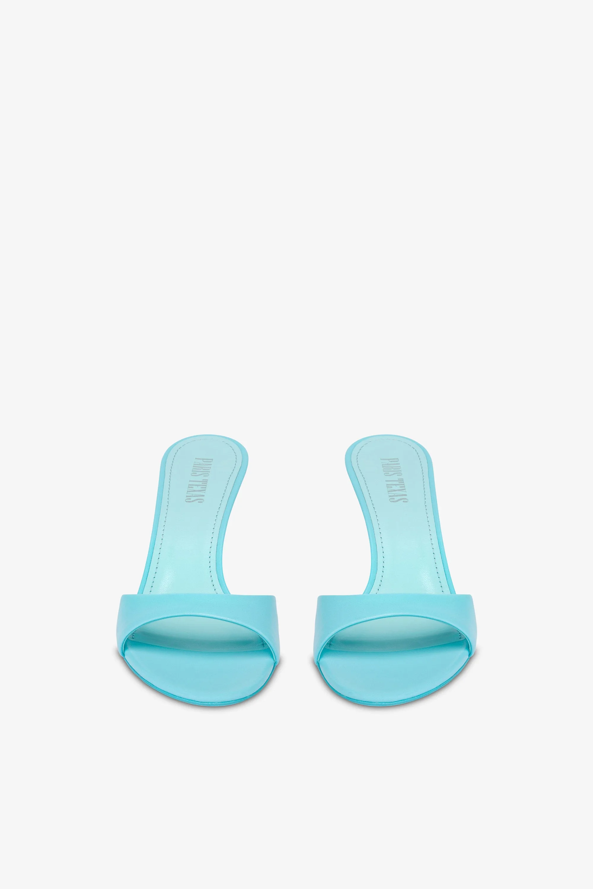 Mules in turquoise leather