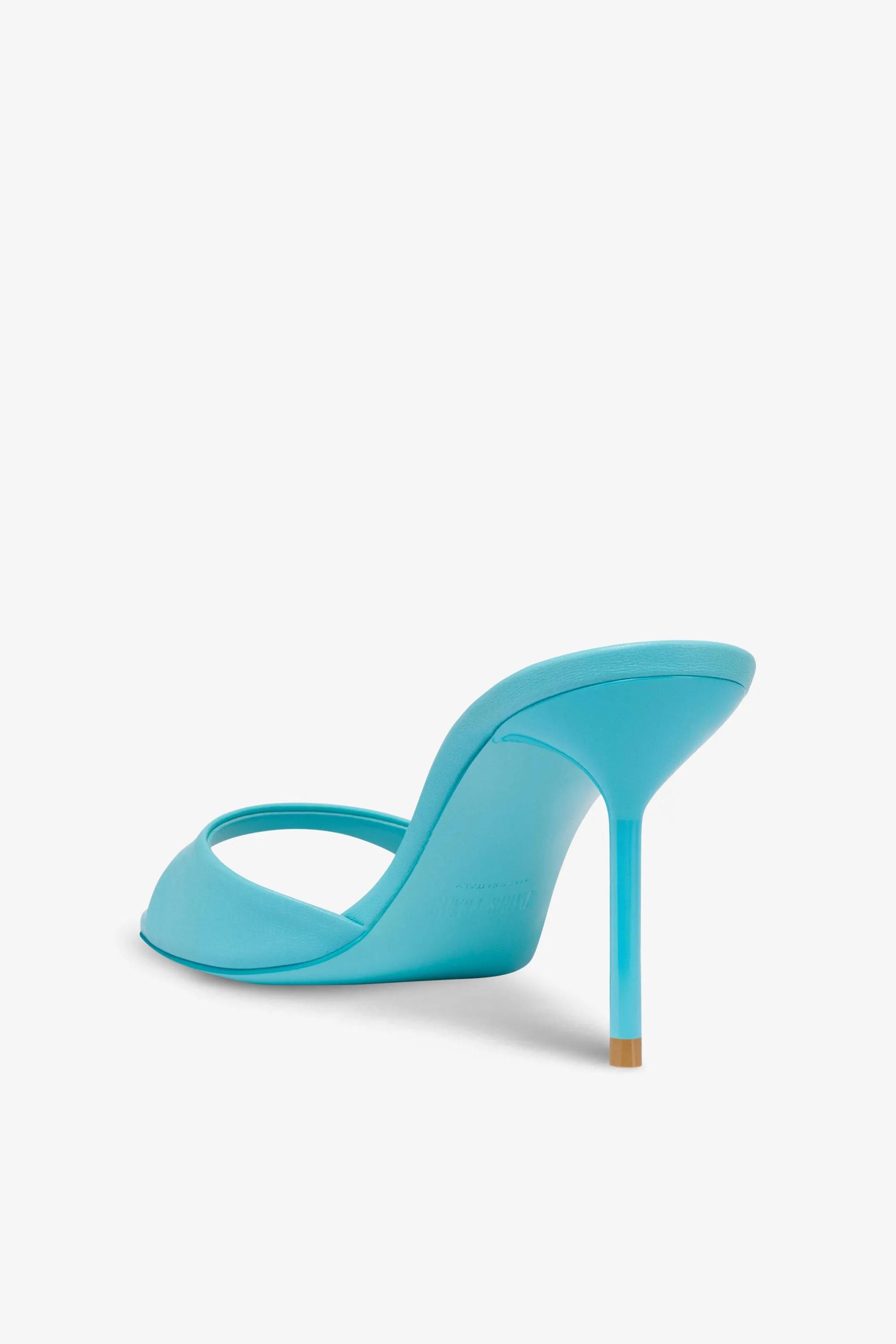 Mules in turquoise leather