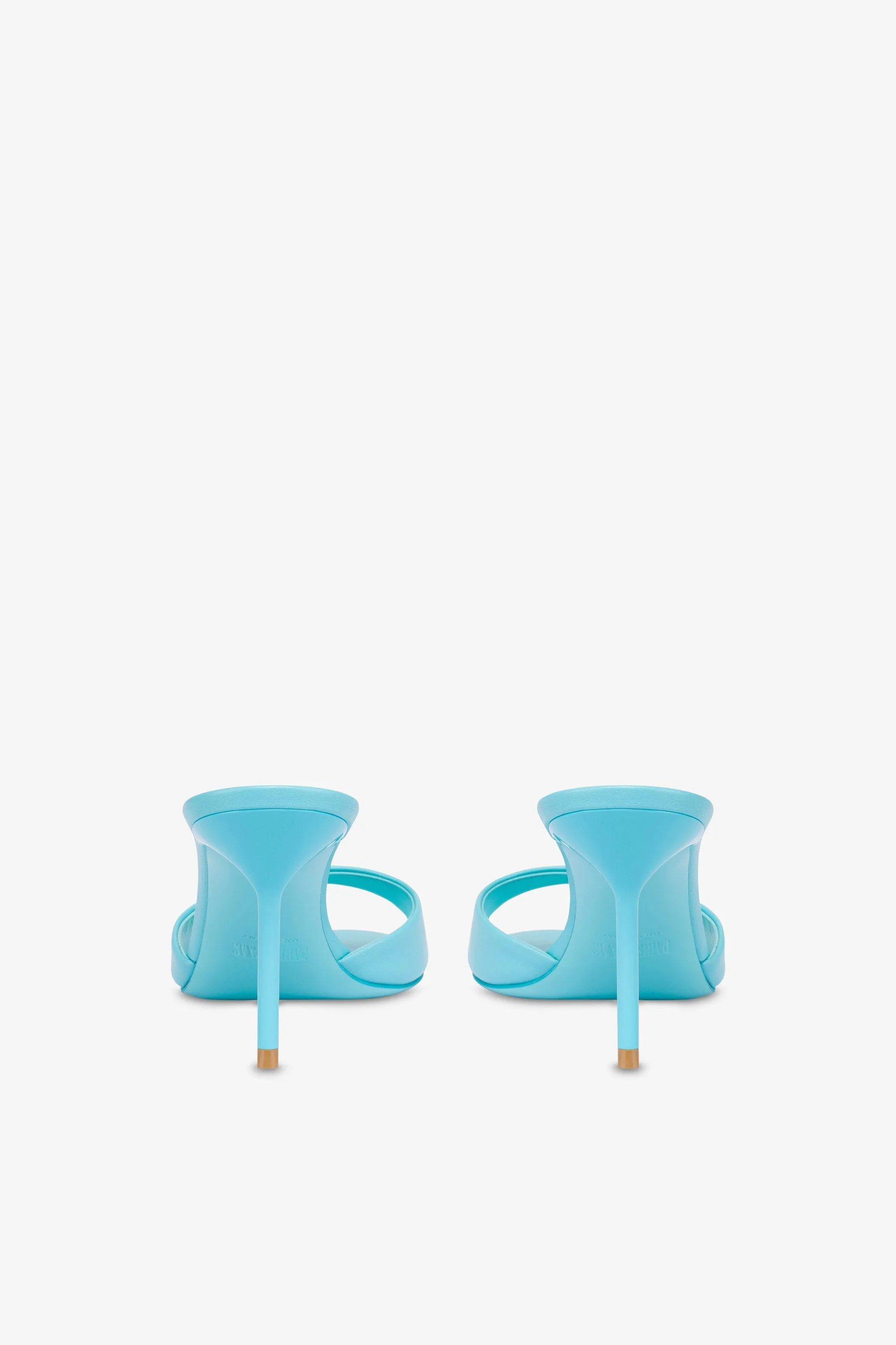 Mules in turquoise leather